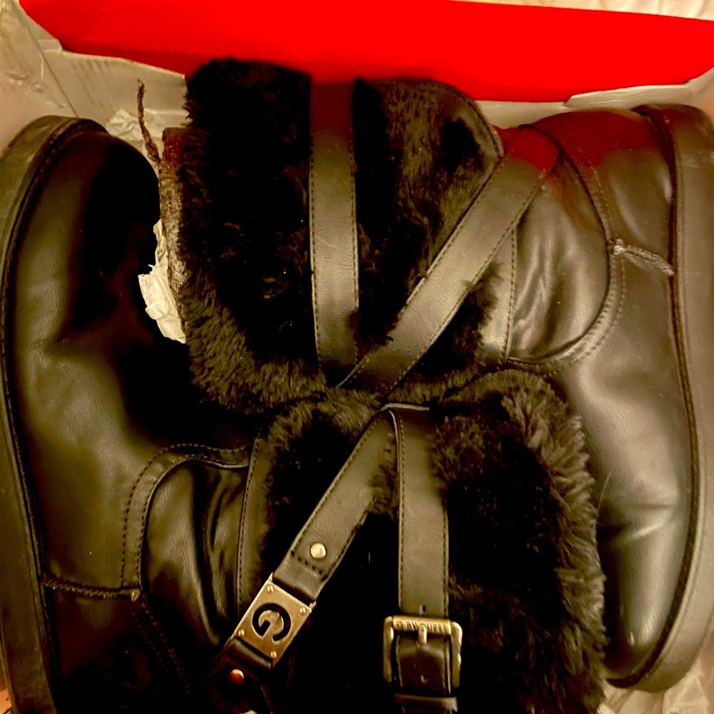 Guess boots never used .